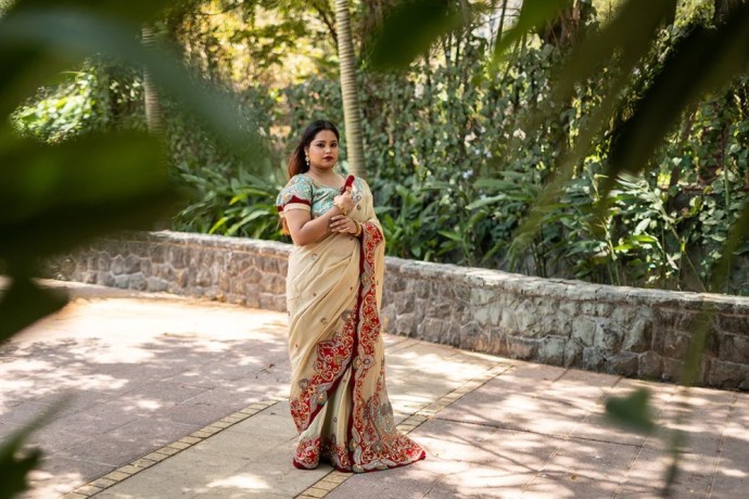 beige-saree-with-red-and-mint-embroidery-big-0